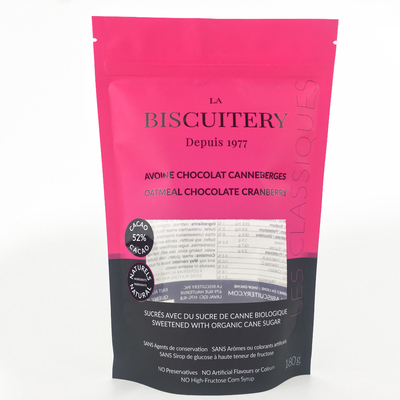 el empaquetado derecho de la bolsa 25g transparente se levanta la bolsa con las nueces de las galletas de la cremallera